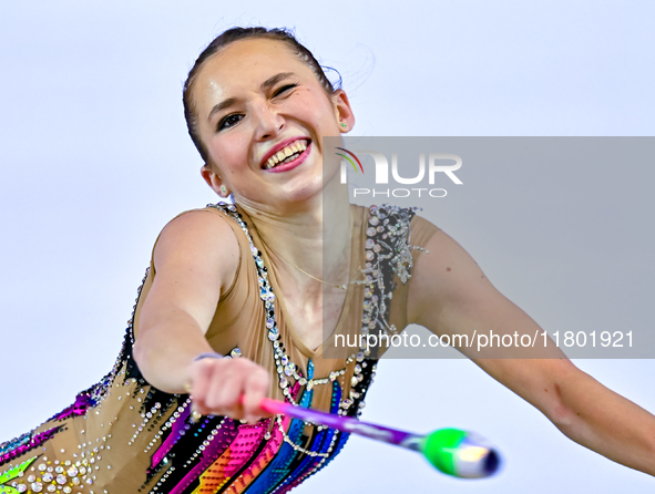 Takhmina Ikromova of Uzbekistan competes in the Clubs final of the International Rhythmic Gymnastics Tournament ''Sky Grace 2024'' at Aspire...