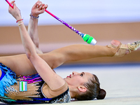 Takhmina Ikromova of Uzbekistan competes in the Clubs final of the International Rhythmic Gymnastics Tournament ''Sky Grace 2024'' at Aspire...