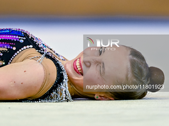 Takhmina Ikromova of Uzbekistan competes in the Clubs final of the International Rhythmic Gymnastics Tournament ''Sky Grace 2024'' at Aspire...