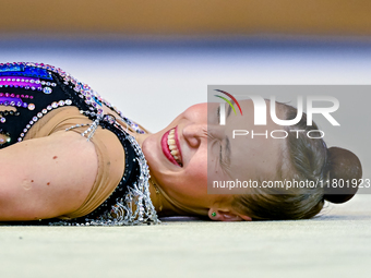 Takhmina Ikromova of Uzbekistan competes in the Clubs final of the International Rhythmic Gymnastics Tournament ''Sky Grace 2024'' at Aspire...