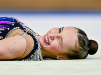 Takhmina Ikromova of Uzbekistan competes in the Clubs final of the International Rhythmic Gymnastics Tournament ''Sky Grace 2024'' at Aspire...