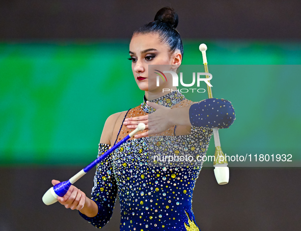 Alina Harnasko of Belarus competes in the Clubs final of the International Rhythmic Gymnastics Tournament ''Sky Grace 2024'' at Aspire Zone...