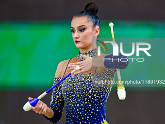 Alina Harnasko of Belarus competes in the Clubs final of the International Rhythmic Gymnastics Tournament ''Sky Grace 2024'' at Aspire Zone...