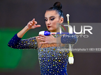 Alina Harnasko of Belarus competes in the Clubs final of the International Rhythmic Gymnastics Tournament ''Sky Grace 2024'' at Aspire Zone...