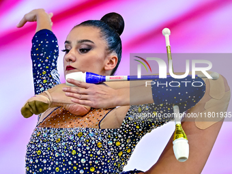 Alina Harnasko of Belarus competes in the Clubs final of the International Rhythmic Gymnastics Tournament ''Sky Grace 2024'' at Aspire Zone...