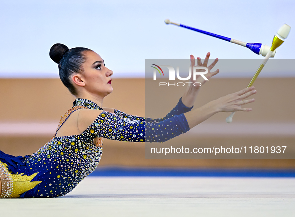 Alina Harnasko of Belarus competes in the Clubs final of the International Rhythmic Gymnastics Tournament ''Sky Grace 2024'' at Aspire Zone...