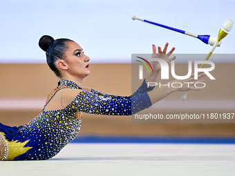 Alina Harnasko of Belarus competes in the Clubs final of the International Rhythmic Gymnastics Tournament ''Sky Grace 2024'' at Aspire Zone...