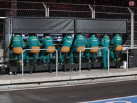 The Aston Martin team observes data screens while Fernando Alonso drives in the third Free Practice session of the Formula 1 Heineken Silver...