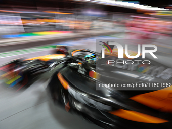 Oscar Piastri emerges from the McLaren garage during the third Free Practice session of the Formula 1 Heineken Silver Las Vegas Grand Prix i...