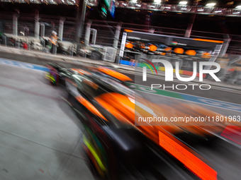 Oscar Piastri emerges from the McLaren garage during the third Free Practice session of the Formula 1 Heineken Silver Las Vegas Grand Prix i...