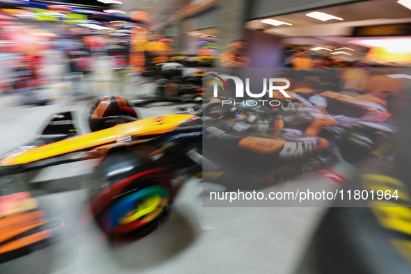 Oscar Piastri emerges from the McLaren garage during the third Free Practice session of the Formula 1 Heineken Silver Las Vegas Grand Prix i...