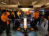 The McLaren team prepares in the garage ahead of Oscar Piastri's drive in the third Free Practice session of the Formula 1 Heineken Silver L...