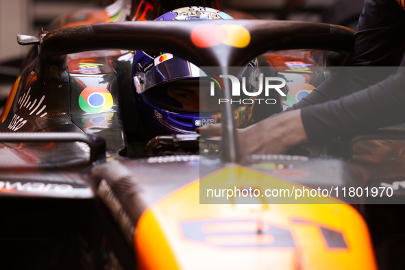 The McLaren team prepares in the garage ahead of Oscar Piastri's drive in the third Free Practice session of the Formula 1 Heineken Silver L...