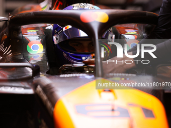 The McLaren team prepares in the garage ahead of Oscar Piastri's drive in the third Free Practice session of the Formula 1 Heineken Silver L...