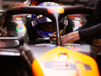 The McLaren team prepares in the garage ahead of Oscar Piastri's drive in the third Free Practice session of the Formula 1 Heineken Silver L...