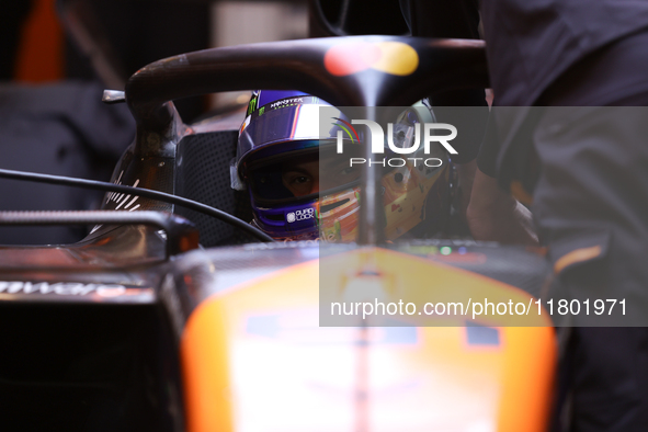 The McLaren team prepares in the garage ahead of Oscar Piastri's drive in the third Free Practice session of the Formula 1 Heineken Silver L...