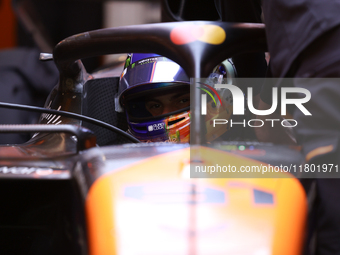 The McLaren team prepares in the garage ahead of Oscar Piastri's drive in the third Free Practice session of the Formula 1 Heineken Silver L...