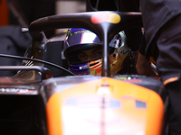 The McLaren team prepares in the garage ahead of Oscar Piastri's drive in the third Free Practice session of the Formula 1 Heineken Silver L...