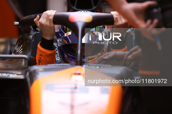 The McLaren team prepares in the garage ahead of Oscar Piastri's drive in the third Free Practice session of the Formula 1 Heineken Silver L...