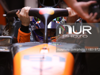 The McLaren team prepares in the garage ahead of Oscar Piastri's drive in the third Free Practice session of the Formula 1 Heineken Silver L...