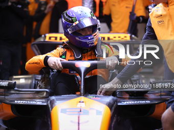 The McLaren team prepares in the garage ahead of Oscar Piastri's drive in the third Free Practice session of the Formula 1 Heineken Silver L...