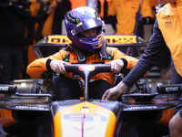 The McLaren team prepares in the garage ahead of Oscar Piastri's drive in the third Free Practice session of the Formula 1 Heineken Silver L...