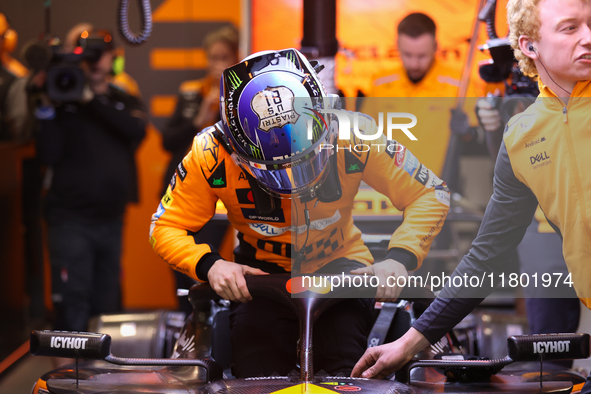 The McLaren team prepares in the garage ahead of Oscar Piastri's drive in the third Free Practice session of the Formula 1 Heineken Silver L...