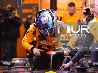 The McLaren team prepares in the garage ahead of Oscar Piastri's drive in the third Free Practice session of the Formula 1 Heineken Silver L...