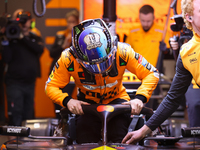 The McLaren team prepares in the garage ahead of Oscar Piastri's drive in the third Free Practice session of the Formula 1 Heineken Silver L...