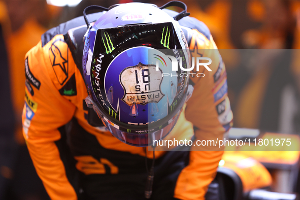 The McLaren team prepares in the garage ahead of Oscar Piastri's drive in the third Free Practice session of the Formula 1 Heineken Silver L...