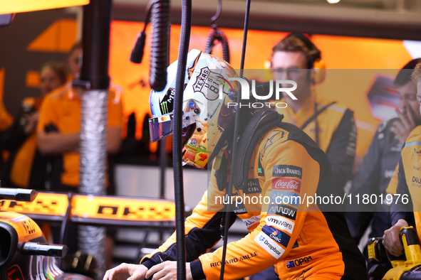 The McLaren team prepares in the garage ahead of Oscar Piastri's drive in the third Free Practice session of the Formula 1 Heineken Silver L...