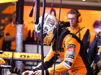 The McLaren team prepares in the garage ahead of Oscar Piastri's drive in the third Free Practice session of the Formula 1 Heineken Silver L...