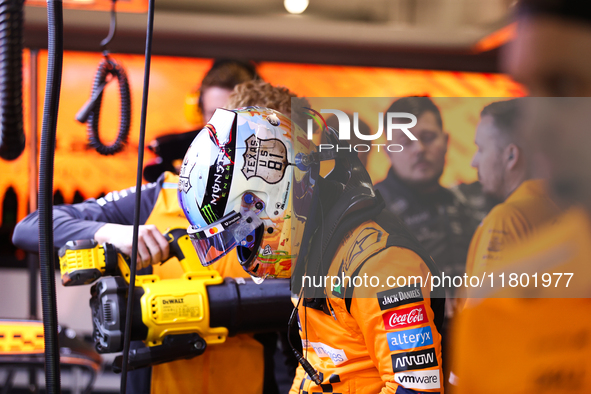 The McLaren team prepares in the garage ahead of Oscar Piastri's drive in the third Free Practice session of the Formula 1 Heineken Silver L...