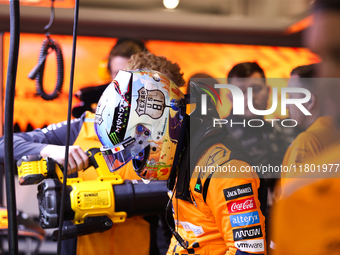 The McLaren team prepares in the garage ahead of Oscar Piastri's drive in the third Free Practice session of the Formula 1 Heineken Silver L...