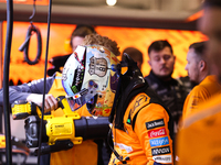 The McLaren team prepares in the garage ahead of Oscar Piastri's drive in the third Free Practice session of the Formula 1 Heineken Silver L...