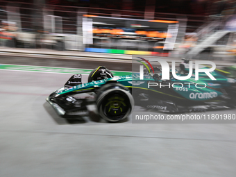 Lance Stroll drives in the pit lane garage during the third Free Practice session of the Formula 1 Heineken Silver Las Vegas Grand Prix in L...