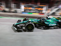 Lance Stroll drives in the pit lane garage during the third Free Practice session of the Formula 1 Heineken Silver Las Vegas Grand Prix in L...