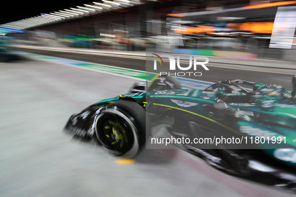 Lance Stroll drives in the pit lane garage during the third Free Practice session of the Formula 1 Heineken Silver Las Vegas Grand Prix in L...