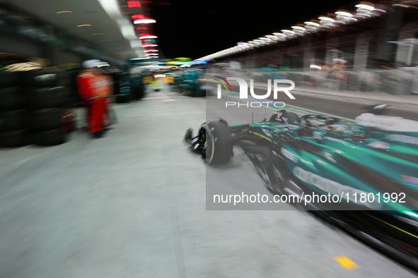 Lance Stroll drives in the pit lane garage during the third Free Practice session of the Formula 1 Heineken Silver Las Vegas Grand Prix in L...