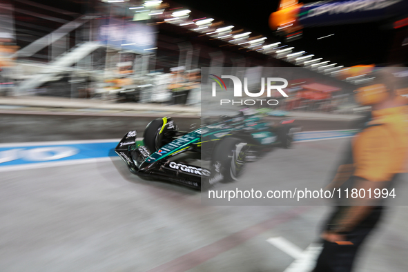 Lance Stroll drives in the pit lane garage during the third Free Practice session of the Formula 1 Heineken Silver Las Vegas Grand Prix in L...