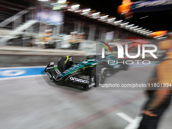 Lance Stroll drives in the pit lane garage during the third Free Practice session of the Formula 1 Heineken Silver Las Vegas Grand Prix in L...