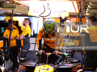 Lando Norris prepares in the McLaren garage during the third Free Practice session of the Formula 1 Heineken Silver Las Vegas Grand Prix in...