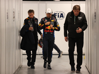 Sergio Perez walks out of the FIA garage after qualifying during the Formula 1 Heineken Las Vegas Grand Prix in Las Vegas, Nevada. (