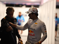 Sergio Perez walks out of the FIA garage after qualifying during the Formula 1 Heineken Las Vegas Grand Prix in Las Vegas, Nevada. (