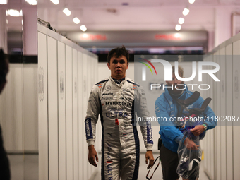 Alexander Albon walks out of the FIA garage after qualifying during the Formula 1 Heineken Las Vegas Grand Prix in Las Vegas, Nevada. (