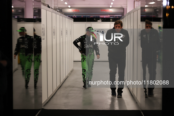 Valtteri Bottas walks out of the FIA garage after qualifying during the Formula 1 Heineken Las Vegas Grand Prix in Las Vegas, Nevada. 