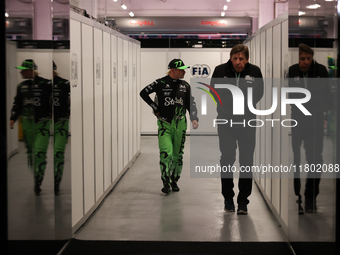 Valtteri Bottas walks out of the FIA garage after qualifying during the Formula 1 Heineken Las Vegas Grand Prix in Las Vegas, Nevada. (