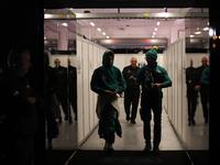 Lance Stroll walks out of the FIA garage after qualifying during the Formula 1 Heineken Las Vegas Grand Prix in Las Vegas, Nevada. (