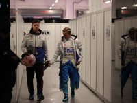 Liam Lawson walks out of the FIA garage after qualifying during the Formula 1 Heineken Las Vegas Grand Prix in Las Vegas, Nevada. (