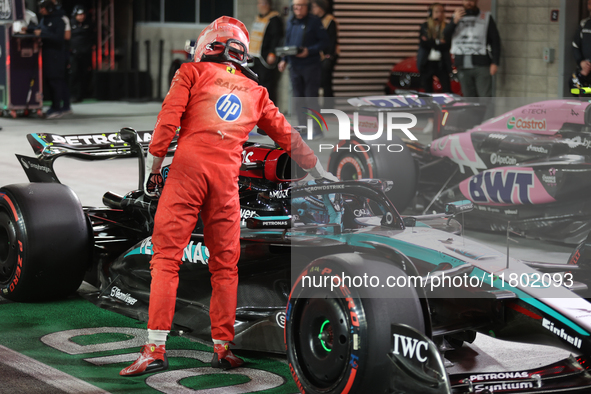 Carlos Sainz congratulates George Russell on his P1 Qualifying finish during the Formula 1 Heineken Las Vegas Grand Prix in Las Vegas, Nevad...